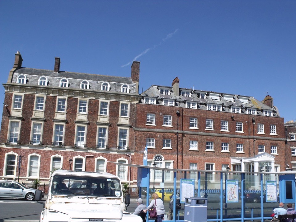A long Georgian terrace on the Esplanade at Weymouth in Dorset